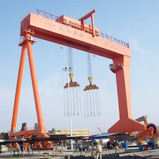 Industrial overhead crane in shipbuilding workshop