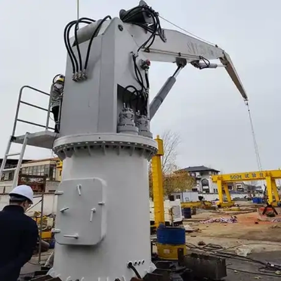 Folding jib crane on vessel deck