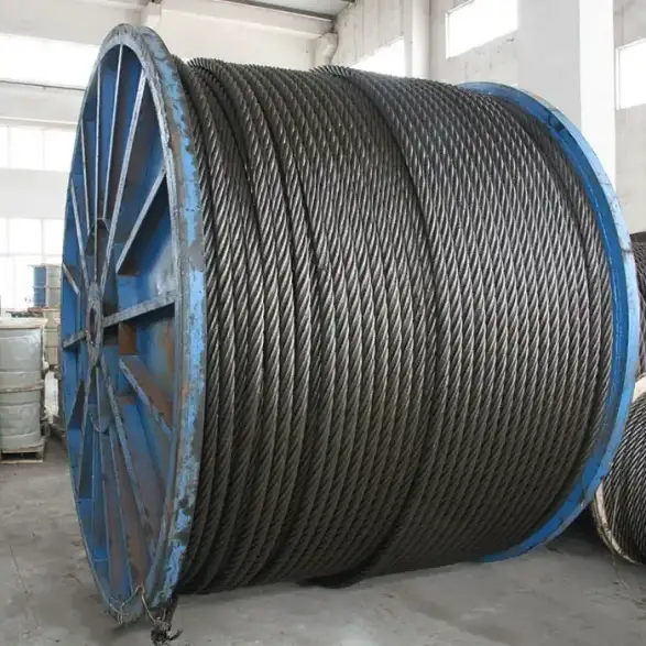 Technician Inspecting Wire Rope on Mobile Crane